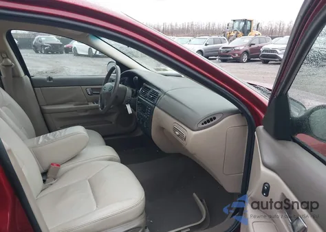 2000 Ford Taurus Ses z USA, uszkodzony, nr VIN 1FAFP55S9YA216664